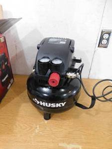 lot 64 image: Husky 3 Gal. 120 PSI Portable Electric Oil-Free Light Duty Pancake Air Compressor with Fold Down Handle and 1-Quick Coupler