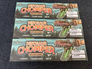 lot 25 image: 3 Dinobros Dinosaur Chompers