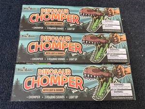 lot 27 image: 3 Dinobros Dinosaur Chompers