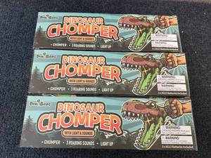 lot 28 image: 3 Dinobros Dinosaur Chompers