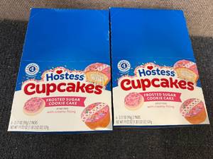 lot 189 image: 2 Packs Of Hostess Frosted Sugar Cookie Cupcakes