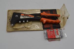 lot 110 image: Rivet gun and rivets