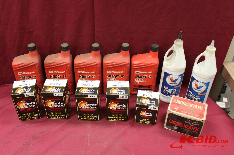 lot 382 image: 5 qts ATF, 2 qts gear oil, oil filters and a engine heater