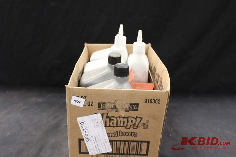 lot 411 image: 3 qts lower unit gear lube, 2 qts dual pump fluid II, oil filter