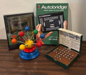lot 67R image: LL -  Kouvalias Musical Fantasy Music Box, Autobridge Puzzle Game Sets, Cross Puzzler by Setko and More
