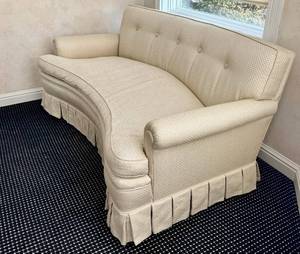 lot 30N image: O - Vintage Curved Sofa - 66 x 36 in, Beige Fabric, Button-Tufted Back, Pleated Skirt