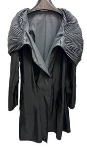 lot 299D image: Mycra Pac Donatella Reversible Hooded Raincoat