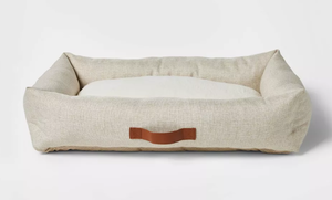 lot 133 image: Boots & Barkley Neutral 4-Sided Bolster Dog Bed - Cream - L 36 Inches (L), 8 Inches (H) x 24 Inches (W) (Slightly Dusty)