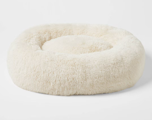 lot 135 image: Boots & Barkley Donut Bolster Dog Bed - Boots & Barkley� - Cream - L 36 Inches (L), 8 Inches (H) x 29 Inches (W)