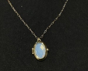 lot 29 image: Guess Gold-Tone Removable Stone Oval Locket Pendant Necklace, 18  3 extender