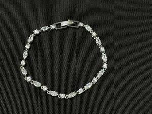 lot 12 image: Givenchy Silver Tone Crystal Tennis Flex Bracelet 7 (Slightly Tarnished)