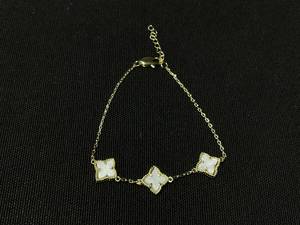 lot 16 image: ADORNIA White Mother of Pearl Flower Bracelet Yellow Gold-Tone Approx. circumference 6.5 - 7.25 adjustable