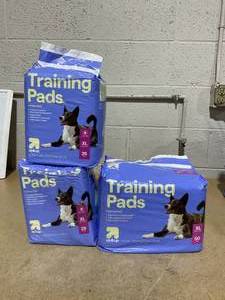 lot 242 image: LOT OF 3 up&up Dog Training Pads (2 Packs Of 25 Count & 1 Pack Of 50 Count, X-Large)