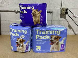 lot 243 image: LOT OF 3 up&up Dog Training Pads (Heavy Duty - 25 count, Reg 50 count, Reg 100 count, Large)