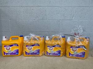 lot 332 image: LOT OF 4 Arm & Hammer Plus OxiClean Odor Blasters HE Liquid Laundry Detergent (2 Missing Caps) (3 Bottles-208 Fl. Oz., 1 Bottle- 166.5 Fl. Oz.)