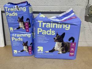 lot 233 image: LOT OF 3 up&up Dog Training Pads (2 Packs Of 25 count, 1 Pack Of 100 count, X-Large)