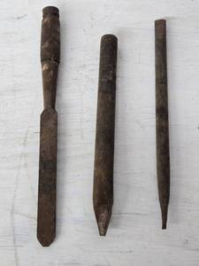 Old Blacksmith Tools including Flat Chisel, Point Chisel, and Round Chisel