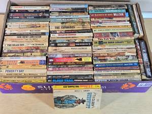 Box of Western Novels including Mack Bolan, Max Brand, and Elmer Kelton Books