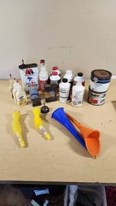 Automotive Fluids and Maintenance Supplies including Marvel Air Tool Oil, STP Power Steering Fluid, and Assorted Greases and Oils - Many Open and Used