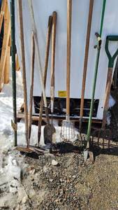 Lot of Garden Tools Including Shovels, Hoes, and Fork