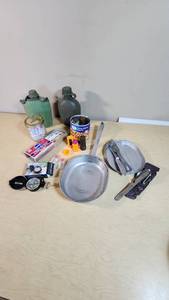 Camping and Survival Gear with Canteens, Compass, Matches, and Cookware