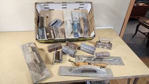 Lot of Masonry Tools including Various Trowels and Floats, Corner Trowels, and Miscellaneous Tools