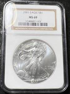 lot 12 image: 2001 AMERICAN SILVER EAGLE NGC MS69