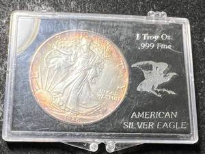 lot 19 image: 1986 AMERICAN SILVER EAGLE 1 TROY OZ .999 FINE SILVER IN CASE