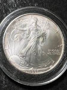 lot 62 image: 1993 AMERICAN SILVER EAGLE 1 TROY OZ .999 FINE SILVER IN AIRTITE