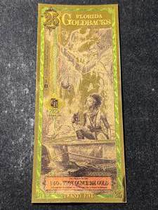 lot 75 image: 140TH TROY OZ 24K GOLD FLORIDA GOLDBACK