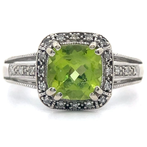 lot 23 image: Estate Natural Peridot & Diamond Halo Split Shank Ring in White Gold