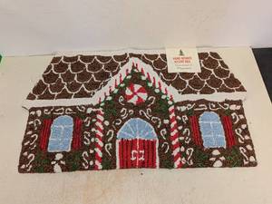 lot 141 image: HAND HOODED ACCENT RUG GINGERBREAD HOUSE BROWN MULTI