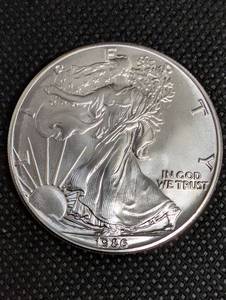 lot 9 image: 1986 Walking Liberty Silver Dollar - 12 oz Fine Silver - $1