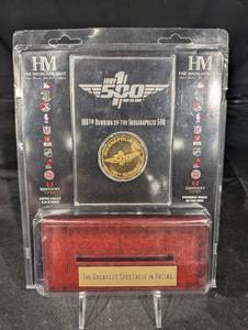 lot 81 image: The Highland Mint 100th Running Indianapolis 500 24KT Gold Flash Plated Coin in Acrylic Display