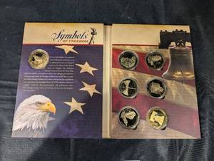 lot 85 image: Symbols of Freedom Coin Set No. 1614534 - 24K Gold-Layered Proof Coins in Presentation Book