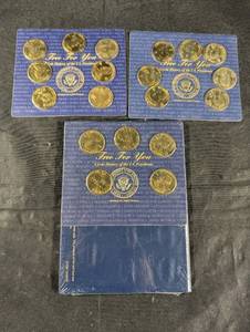 lot 207 image: Three Blue Display Cards - The Free For You A Coin History of the U.S. Presidents (24 Solid Brass Coins)