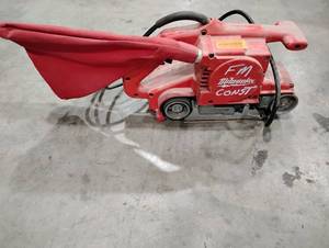 lot 63SK image: Milwaukee 3 by 24 Belt Sander (602850)