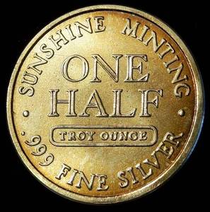 lot 36 image: 12oz 999 Silver Sunshine Minting Round, Toner