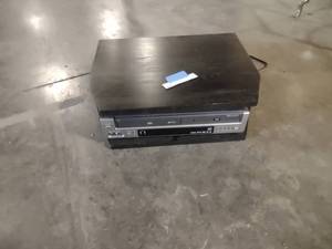 lot 28 image: Small Tv Stand with VCRDVD Player