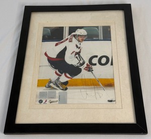 lot 2 image: Alexander Ovechkin Signed and Framed Photo With Frameworth and Ovechkin COA - Hockey Autograph