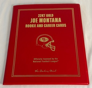 lot 62 image: Joe Montana 23kt Gold Rookie and Career Cards Football Book by Danbury Mint