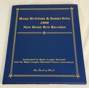 lot 65 image: Mark McGwire and Sammy Sosa 1999 New Home Run Records Gold Card Book by Danbury Mint