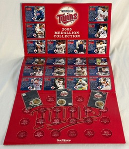 lot 66 image: 2005 Minnesota Twins Medallion Collection Book With 3 Medallions