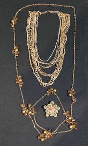 lot 109K image: LL-ST - Gold-Tone Multi-Strand Crystal Necklace with 2-Inch Floral Pendant, 22-Inch Length