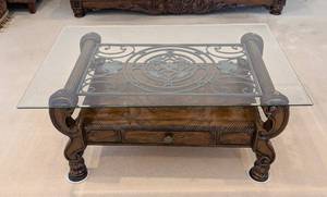 lot 7 image: LR - Ashley Furniture Margilles Glass-Top Coffee Table Dark Wood, Ornate Base