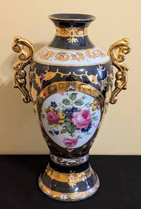 lot 26 image: MB - Vase - European Design Decorative Porcelain with Floral Medallion & Gold Handle
