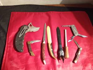 lot 27 image: 4 knives, 3 letter openers, and a knife sharpener