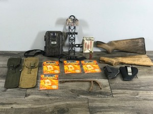 lot 263 image: Tasco Game Camera - Hand Warmers - Fish Hook Remover - Pistol Holders - Wood Gun Stocks - Fuse Bow Quiver - Vintage Military Weapon Cleaning Pouches - Bow Tips