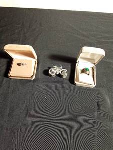 lot 42 image: Sterling silver ring, High school class ring, and a bicycle trinket box with bicycle necklace and earrings