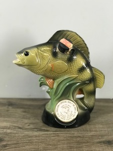 lot 285 image: Vintage Jim Beam Bourbon Whiskey Decanter Perch Fish Regal China with Official Seal National Fresh Water Fishing Hall of Fame Hayward, WI